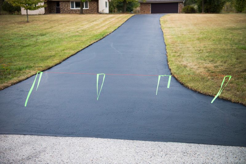 Residential Driveway with Fresh Blacktop