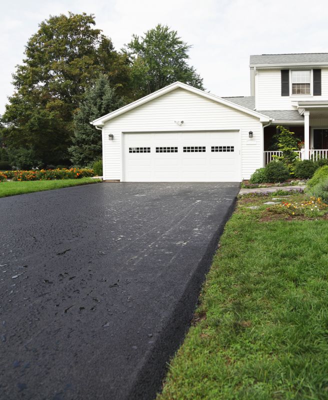 Blacktop Driveway with Landscaping